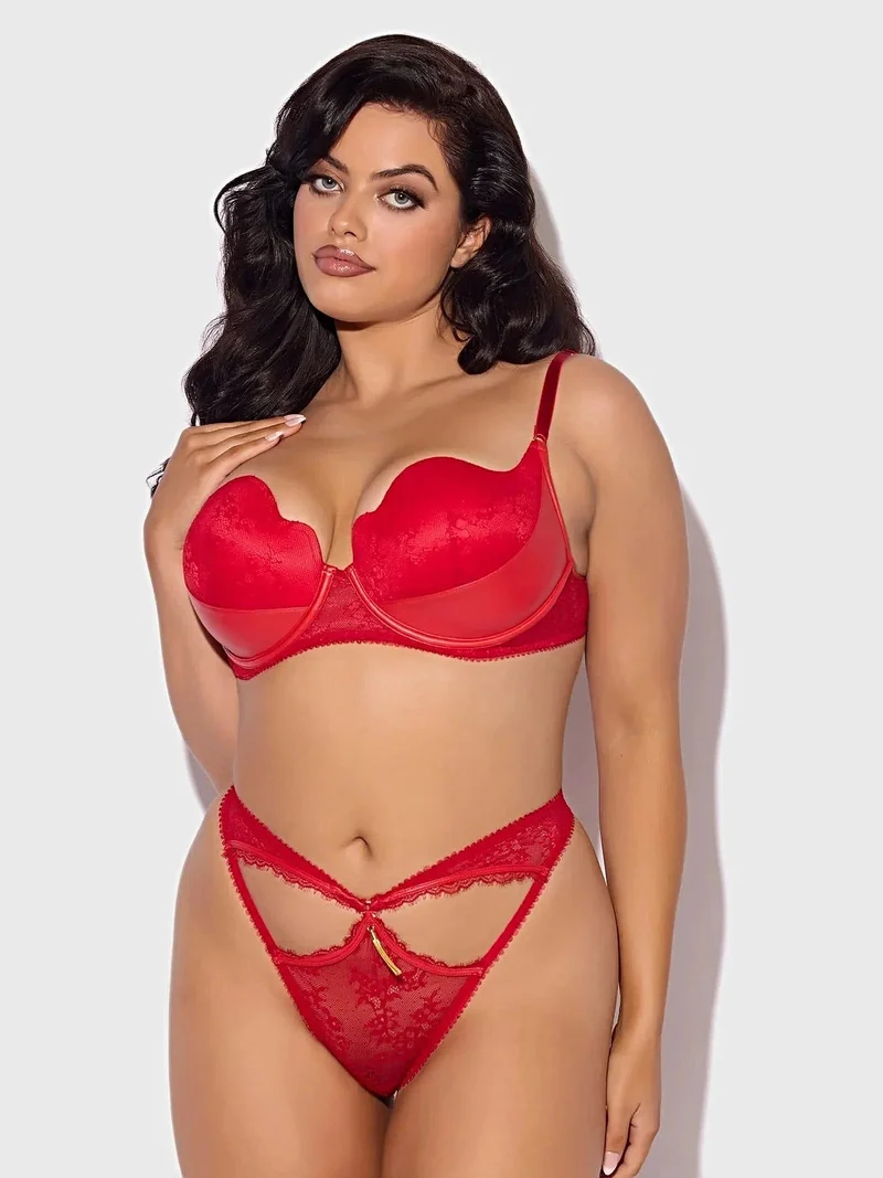 Kiki Dessous-Set aus Kunstleder mit Bügel-Balconette-BH aus Spitze und rückenfreiem Hüftslip