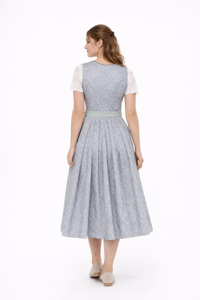 Dirndl aus Baumwolldruck mit uni Schürze