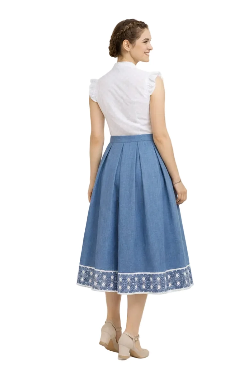 Sommerbluse aus bestickter Baumwolle mit Lochmuste
