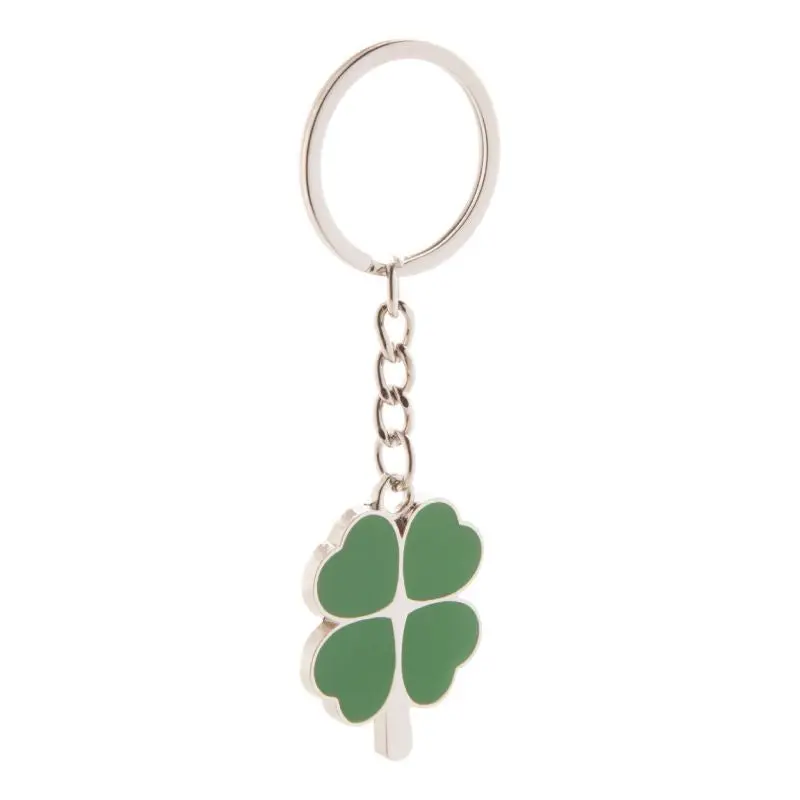 Lucky Schlüsselanhänger in Silber mit Grünen Akzenten - Glücksbringer Accessoire