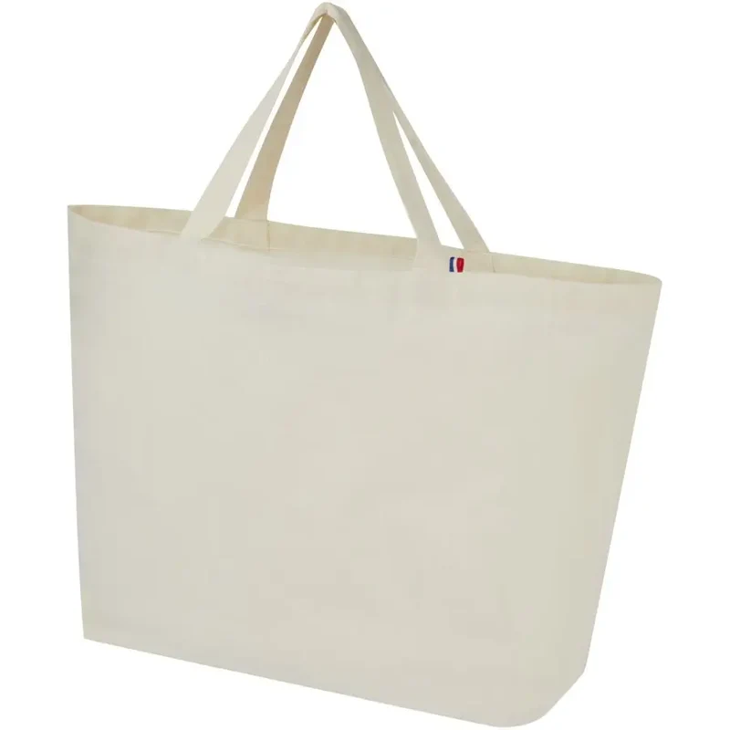 Entdecken Sie die Cannes 200 g/m² Shopper Tragetasche aus recyceltem Material 10L – natur, nachhaltig und stilvoll