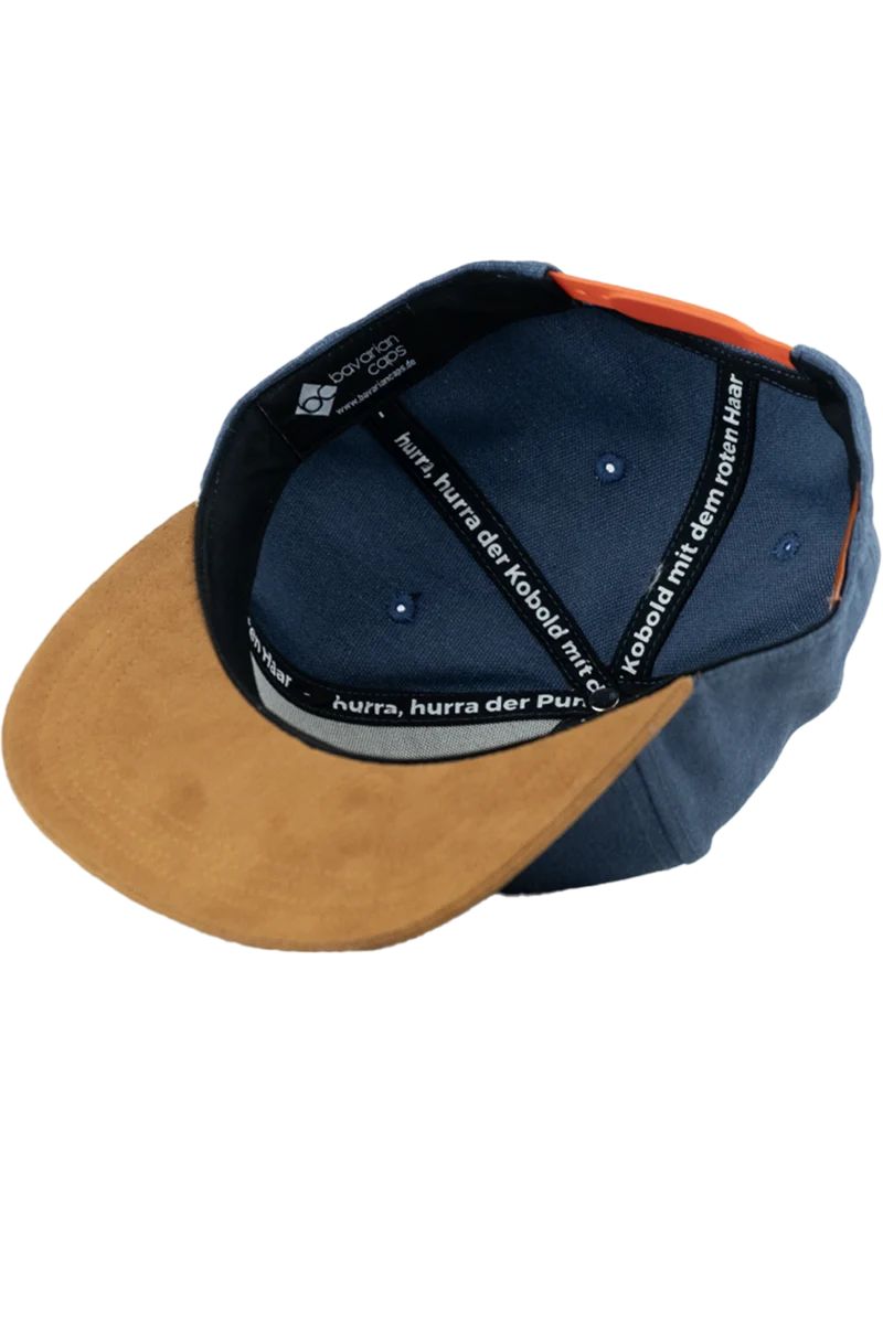 Unisex Snapback-Cap 'Pumuckl tanzt' mit Baumwoll Canvas