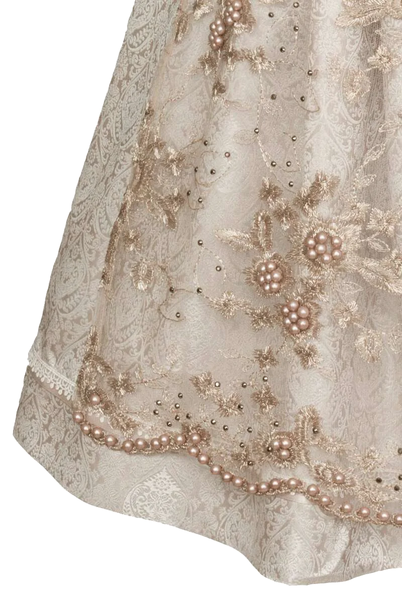 Mini-Dirndl mit transparenter Schürze und Perlen
